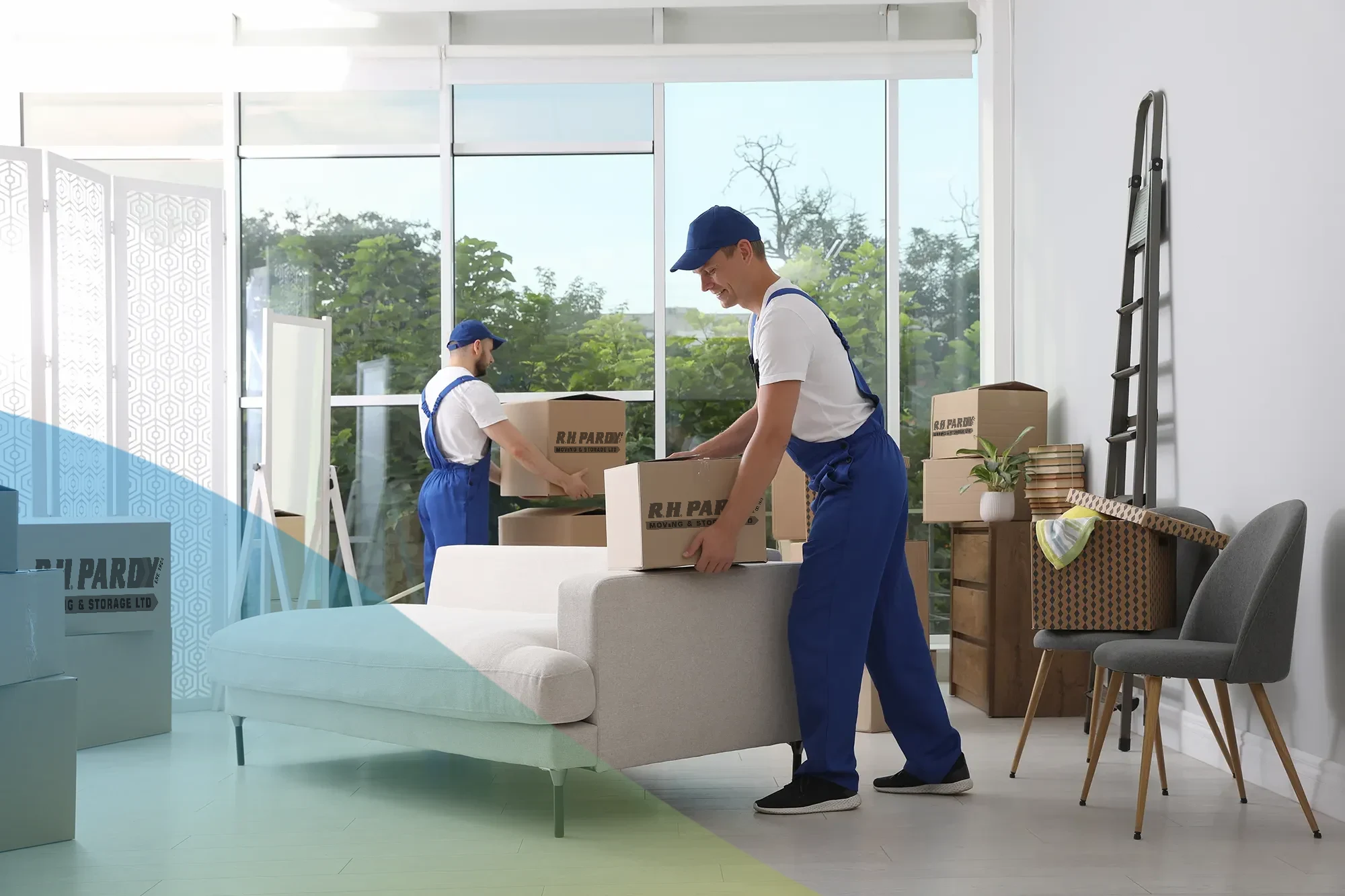 A removals company organizing boxes for the move in a home